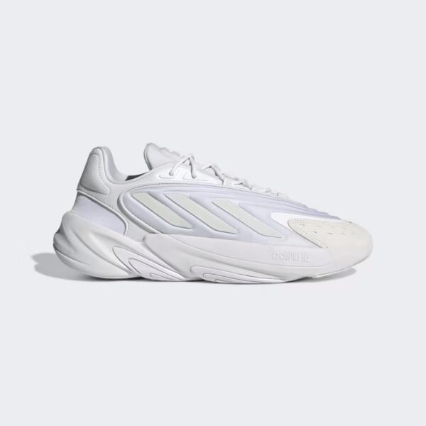 white adidas ozelia in a white background.