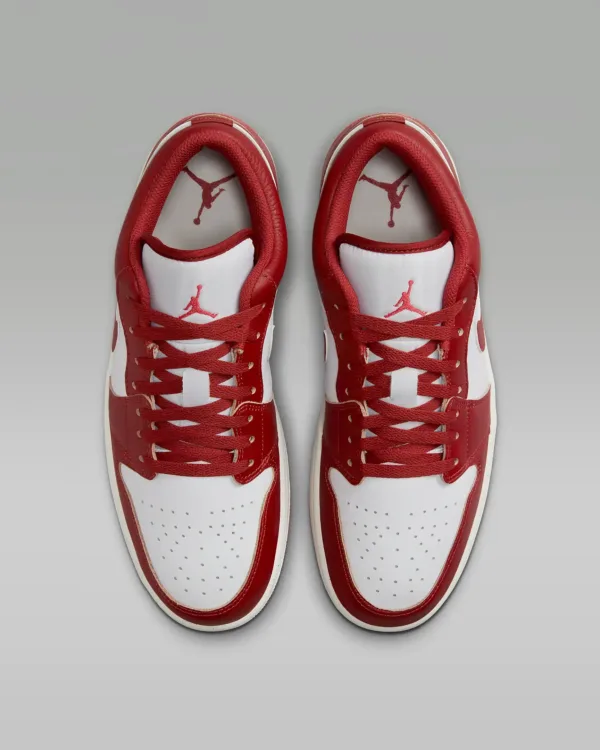 front view of pair of nike air jordan low red