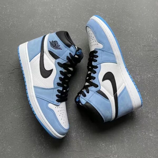 pair of nike aj high unc top side view