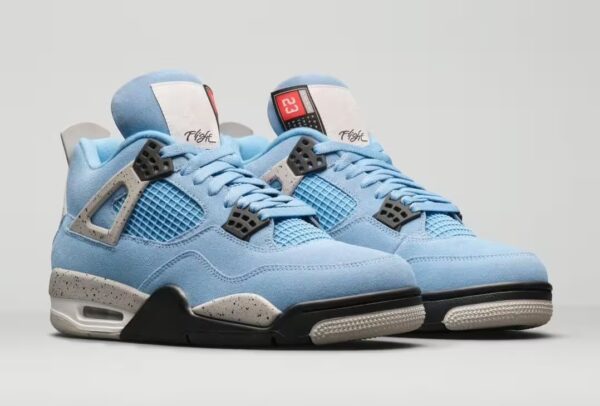 pair of jordan 4 university blue