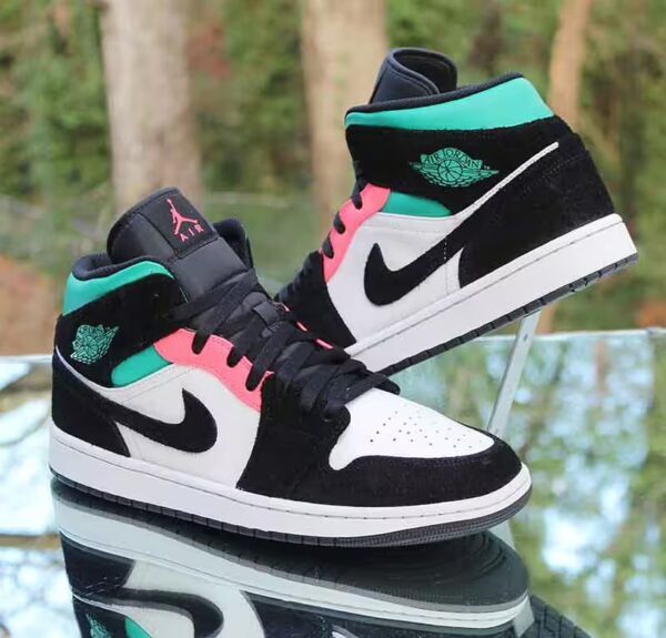 pair of jordan se south beach on table