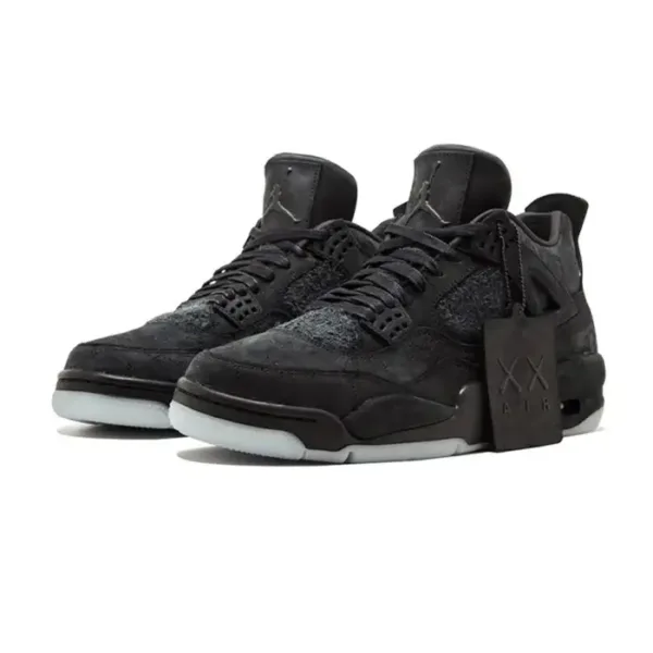 pair of jordan 4 kaws black