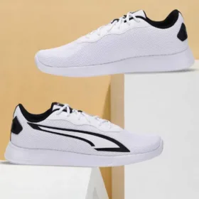 pair of puma tychonic sneakers white