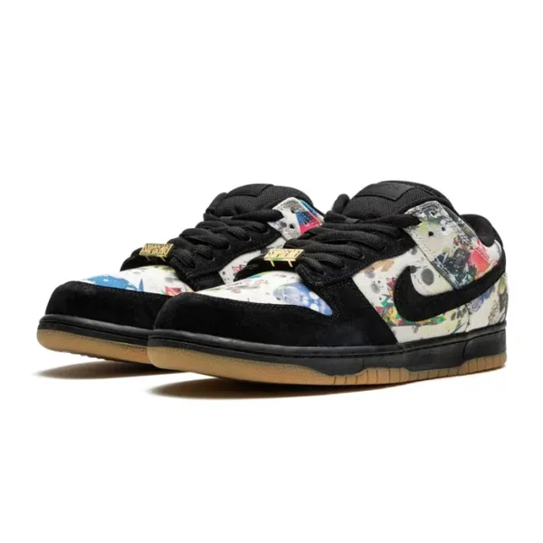 pair of nike dunk black rammellzee