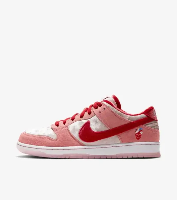 nike sb dunk strangelove pink side view