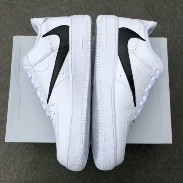 pair of nike air force reverse swoosh