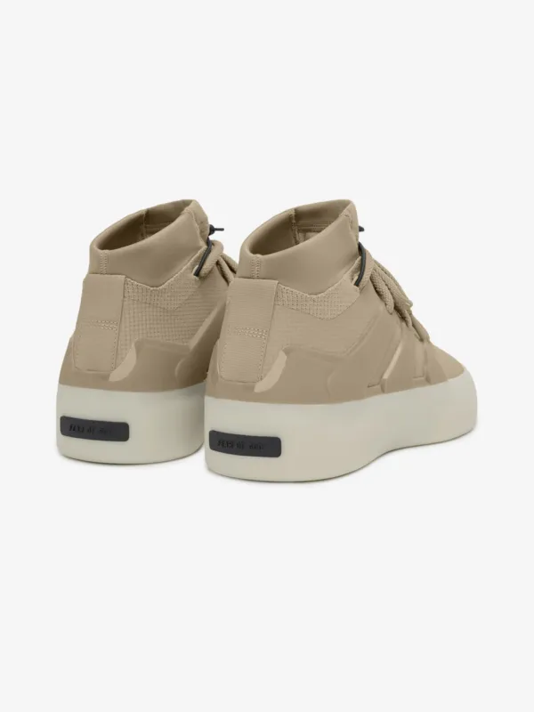 back view of fear of god beige