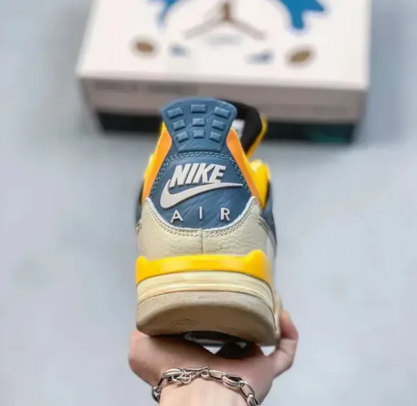 air jordan yellow snorlax in hand